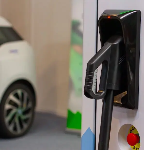 Electric car charging station plug