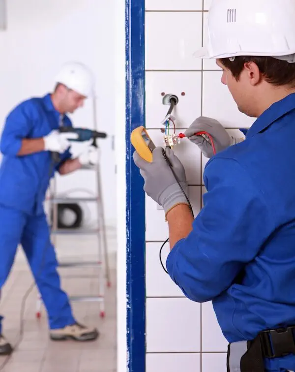 Electricians working with tools safety