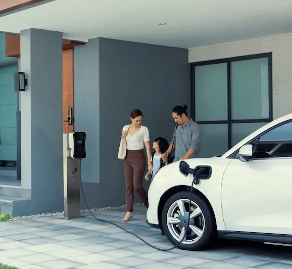 Family with electric vehicle charging