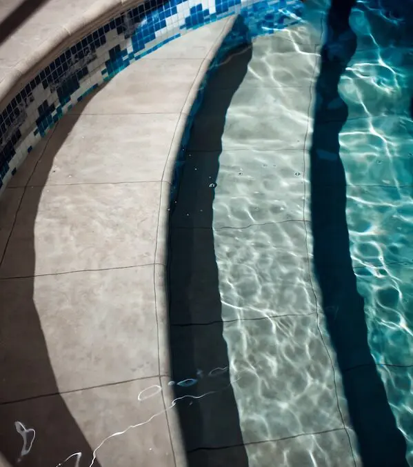 Pool steps with mosaic tiles